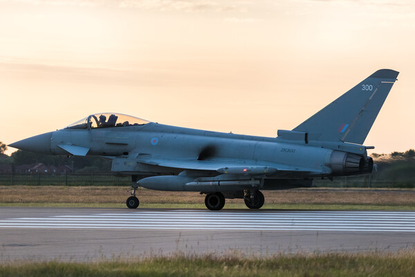 RAF Typhoon prepares to take off at sunset Picture Board by Jason Wells