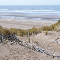 Buy canvas prints of Fallen fence leading down to Formby beach by Jason Wells