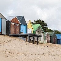 Buy canvas prints of Beach huts in Abersoch Bay by Jason Wells