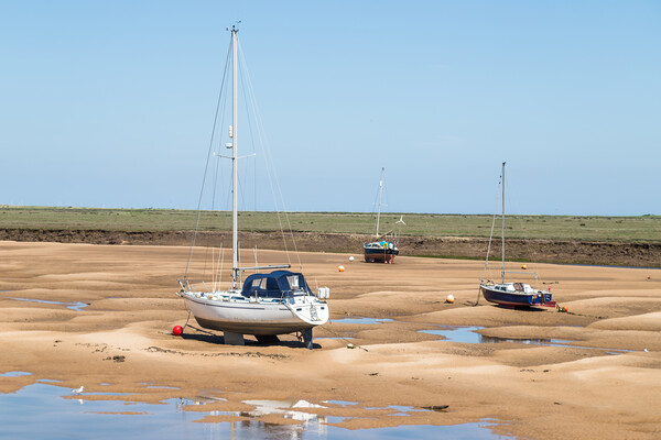 Trio of boats at Wells next the Sea Picture Board by Jason Wells