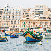 Buy canvas prints of Spinola Bay full of colourful boats by Jason Wells