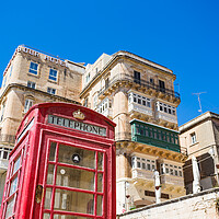 Buy canvas prints of Red phone box in Valletta by Jason Wells