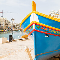 Buy canvas prints of Luzzu boat on the edge of Spinola Bay by Jason Wells