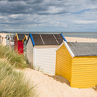Buy canvas prints of Colourful beach huts at Southwold by Jason Wells