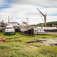 Buy canvas prints of Boats line Woodbridge Quay by Jason Wells