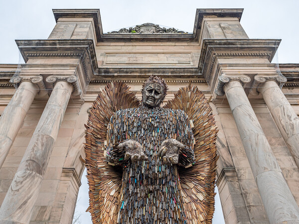 Knife Angel in front of the Grand Entrance Picture Board by Jason Wells