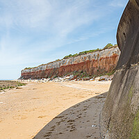 Buy canvas prints of Sea wall at Hunstanton meets the cliffs by Jason Wells