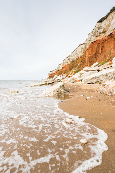 Waves lap up on Hunstanton beach Picture Board by Jason Wells