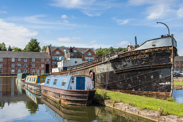 Canal barges moored in Ellesmere Port Picture Board by Jason Wells