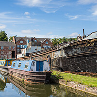 Buy canvas prints of Canal barges moored in Ellesmere Port by Jason Wells