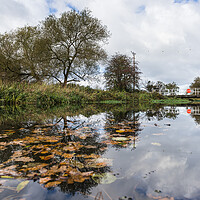 Buy canvas prints of Reflections on the Leeds Liverpool canal by Jason Wells