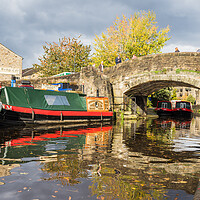 Buy canvas prints of Tourists walking over a bridge in Skipton by Jason Wells