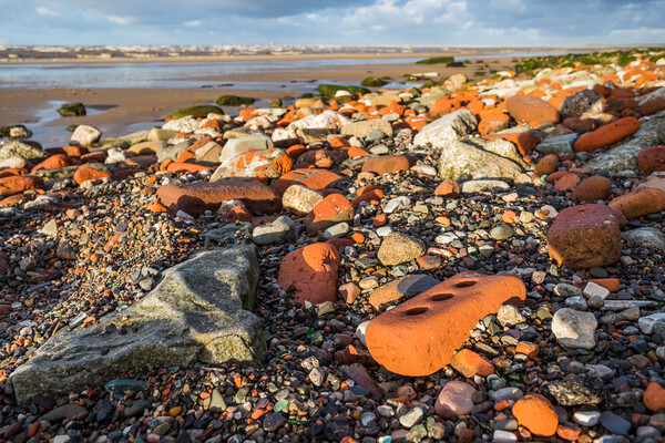 Red bricks up close on Crosby beach Picture Board by Jason Wells