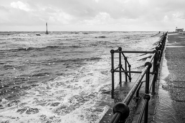 Waves breaking onto the promenade at Crosby Picture Board by Jason Wells