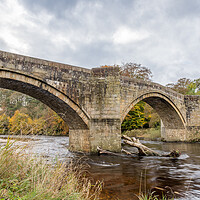 Buy canvas prints of Water flowing under Barden Bridge by Jason Wells