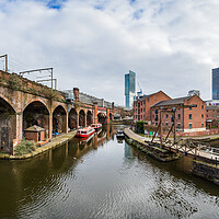 Buy canvas prints of Bridgewater Canal and Manchester skyline panorama by Jason Wells