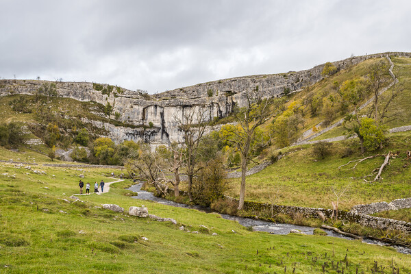 Tourists exploring Malham Cove Picture Board by Jason Wells