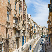 Buy canvas prints of Colourful street in Valletta by Jason Wells