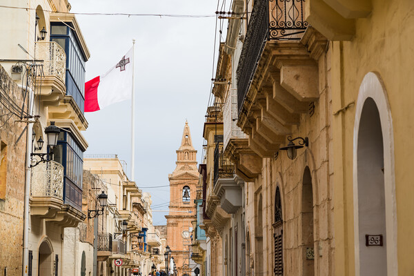 Malta flag in Mellieha Picture Board by Jason Wells