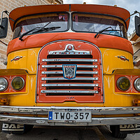 Buy canvas prints of Orange and yellow Leyland DAF bus by Jason Wells