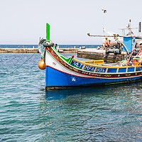 Buy canvas prints of Luzzu boat at Mellieha harbour by Jason Wells