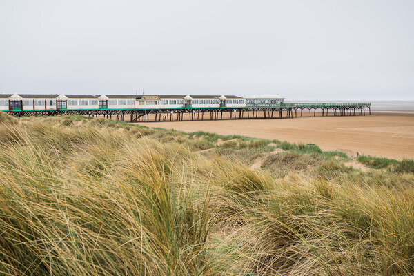 St Anne's Pier behind sand dunes Picture Board by Jason Wells