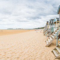 Buy canvas prints of Wells next the Sea beach huts panorama by Jason Wells