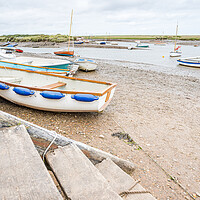 Buy canvas prints of Steps lead down at Burnham Overy Staithe by Jason Wells