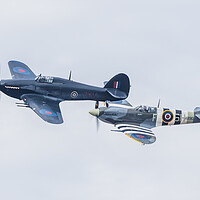 Buy canvas prints of Spitfire and Hurricane pair in formation by Jason Wells