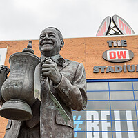Buy canvas prints of Dave Whelan statue by the DW Stadium by Jason Wells