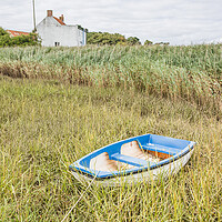 Buy canvas prints of Boat tied at Brancaster Staithe by Jason Wells