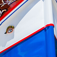 Buy canvas prints of Brightly coloured Luzzu boat by Jason Wells