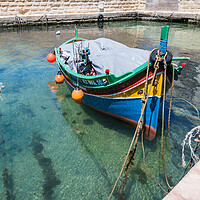 Buy canvas prints of Luzzu boat in clear water by Jason Wells