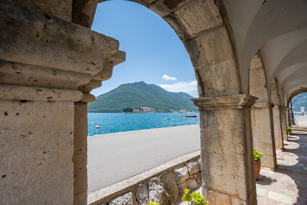 Perast churches through the arches Picture Board by Jason Wells