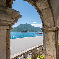 Buy canvas prints of Perast churches through the arches by Jason Wells