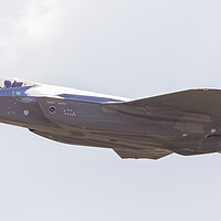 Buy canvas prints of Valkyries F-35A Stealth fighter taking off by Jason Wells