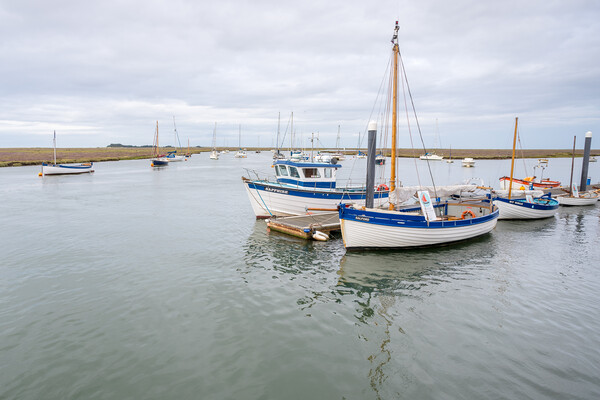 Boats in Wells next the Sea harbour Picture Board by Jason Wells