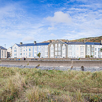 Buy canvas prints of Hotels on Barmouth promenade by Jason Wells