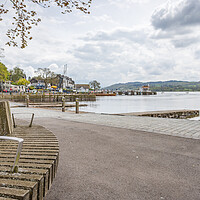 Buy canvas prints of Curved bench overlooking the Ambleside waterfront by Jason Wells