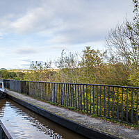 Buy canvas prints of Narrow boat passing over the Pontcysyllte Aqueduct by Jason Wells