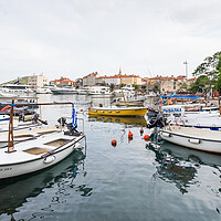 Buy canvas prints of Boats line Budva harbour by Jason Wells