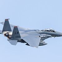 Buy canvas prints of F-15E Strike Eagle banks after take off by Jason Wells