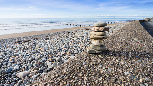 Rock stack at Barmouth Framed Print by Jason Wells