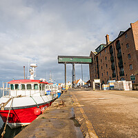 Buy canvas prints of Fishing boat in Wells next the Sea harbour by Jason Wells