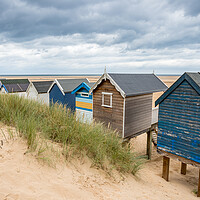 Buy canvas prints of Overlooking the beach huts at Wells next the Sea by Jason Wells
