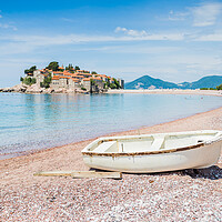 Buy canvas prints of Boat on Ivano Vidoni Beach by Jason Wells