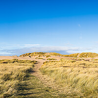 Buy canvas prints of Blue sky above the sand dunes on Formby beach by Jason Wells