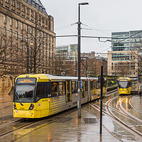 Buy canvas prints of Trams passing in Manchester city centre by Jason Wells