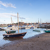 Buy canvas prints of Boats on the shore at Wells next the Sea by Jason Wells