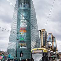 Buy canvas prints of Tram passes the National Football Museum by Jason Wells